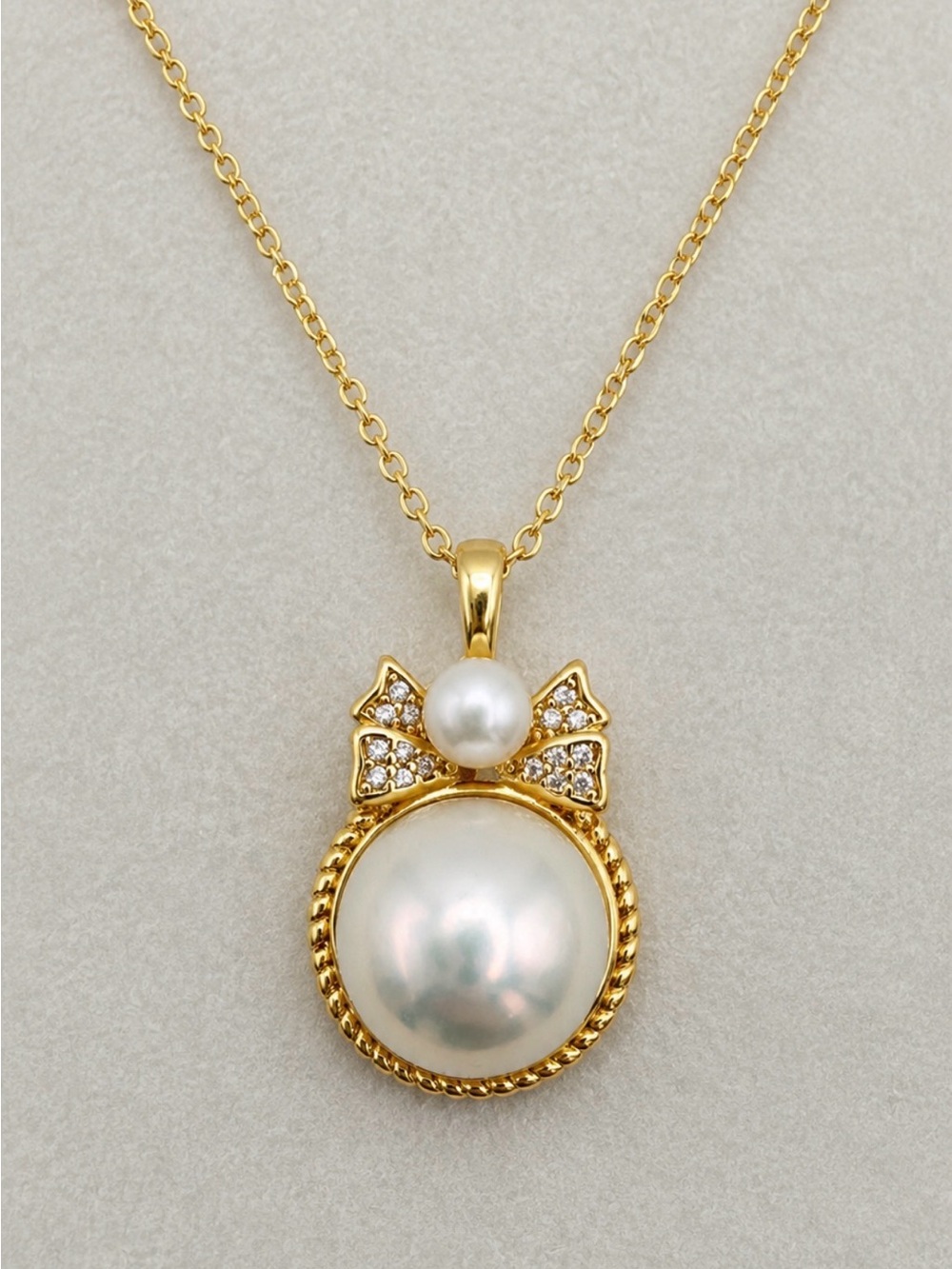 Real fresh water Pearl pendent with bow detailing (selling pendent only)